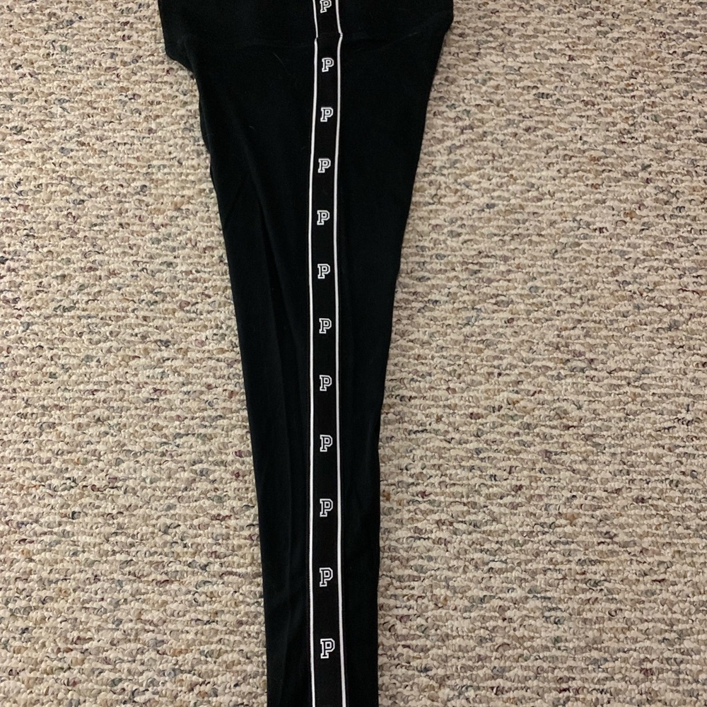 Pink leggings with P’s down the side
